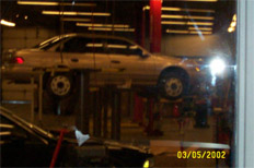 1993 Ford Taurus - Up on the lift.