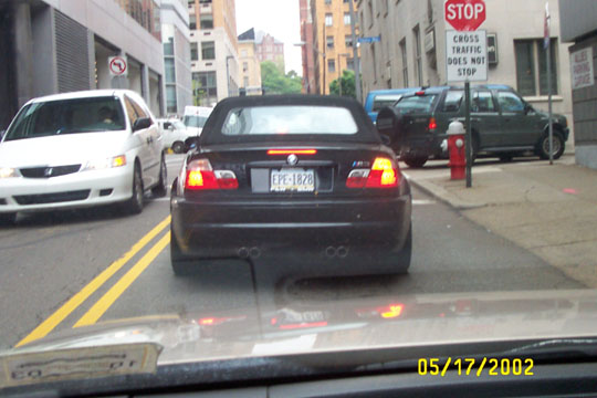 Black convertible rear view with license plate EPE-1828