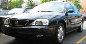1993 Ford Taurus - The idea's simple... make Mike's big, black Mercury Sable look like it's flying down some German road at night. Right now, she's cooling he…