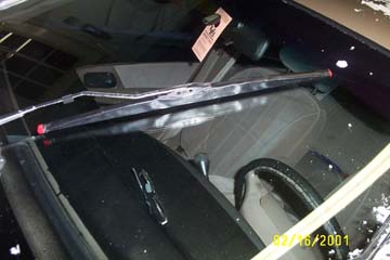 1993 Ford Taurus - Special winter-wiper blades, by Amco. Notce the rubber boot that covers the spring steel. Aggressive construction.