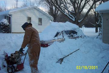 1993 Ford Taurus - Well, it turned out there was over three feet of snow, and it took two shovels, three brooms and a 1960's era snowblower to get her loose.