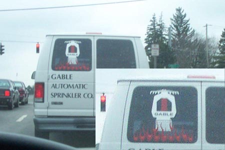 1993 Ford Taurus - White van with 'GABLE AUTOMATIC SPRINKLER CO.' text and logo seen on the road with other vehicles.