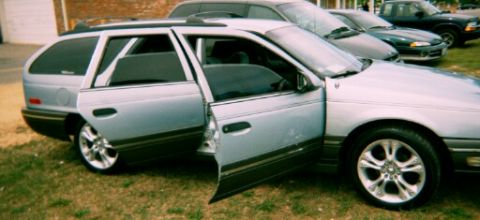 1991 Ford Taurus - that's my second daugter, BABYBLUE sorry, i forgot to get a pic of the duals, nice right.