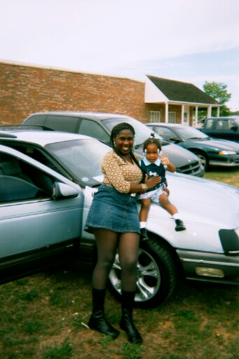 1991 Ford Taurus - my wife and the little one. she didnt want me to post this one, but what the hell!