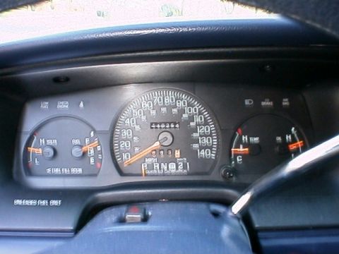 1996 Ford Crown Victoria - Interior view of a 1996 Ford Crown Victoria's dashboard, displaying the speedometer and other vital gauges.