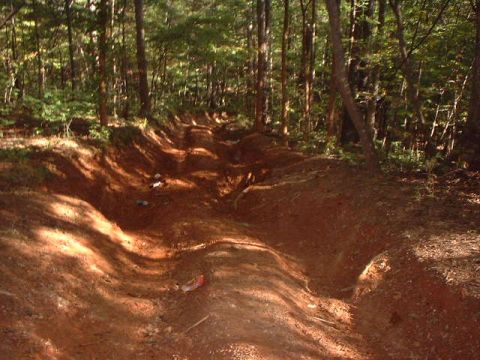 1990 Ford Bronco - the serverly rutted out hill climb