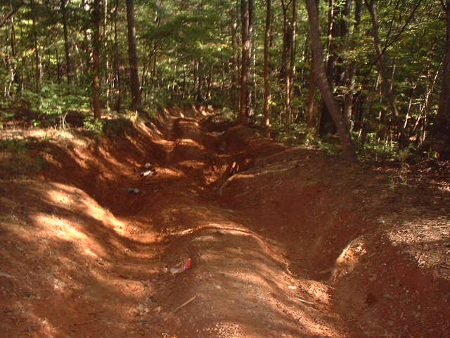 the serverly rutted out hill climb
