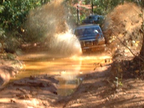 1990 Ford Bronco - this is one of the baddest pits that i have ever seen. mark made it through by staying on the left side of the pit cuz the right was so dee…