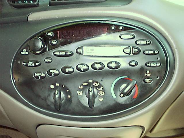 The CDX-P1270 12 Disk CD Player "WILL" work with the factory radio.  Connections from the player to the radio are in the trunk's RCU, left side, just behind the left wheel hub (remove carpet to find).  This was Easy!
