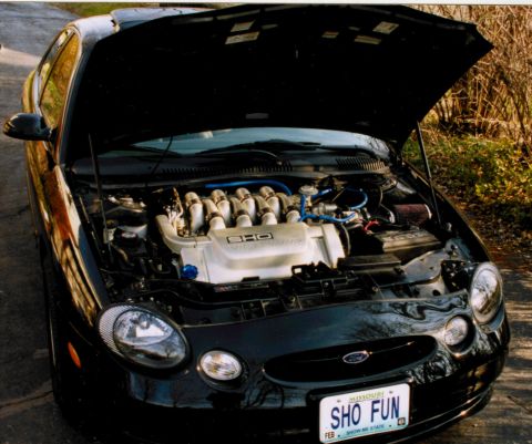 1999 Ford Taurus - It's got eight cylinders and uses 'em all, got overdrive, just won't stall.