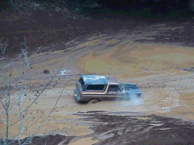 1978 Ford Bronco stuck in mud, 3q-front view