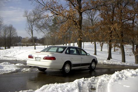 1995 Ford Taurus - Rear Passanger shot at a park in the new(er) snow