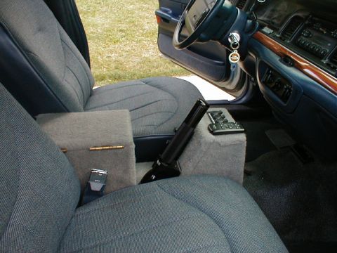 1995 Ford Crown Victoria - Interior view of a 1995 Ford Crown Victoria, highlighting the custom center console and seating.