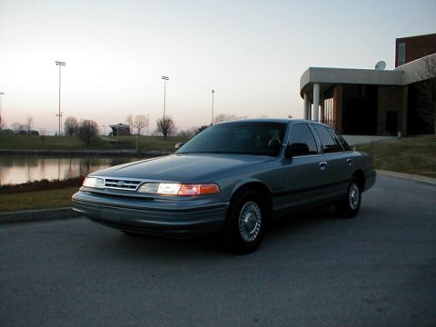 1995 Ford Crown Victoria - This 1995 Ford Crown Victoria is captured in a three-quarter front view, its classic sedan profile.