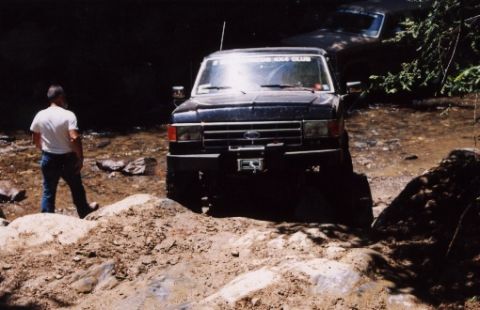 1987 Ford Bronco - I'm about to attempt to climb the ledge at Fain's Ford.