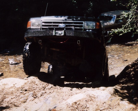 1987 Ford Bronco - Front axle up & over.