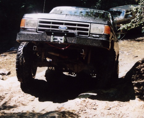 1987 Ford Bronco - Now the back axle's about to hop up. Piece of cake, when you're locked! Our spotter said it REALLY made a believer out of him for getting l…