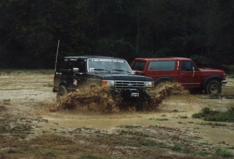 1987 Ford Bronco - Here's my son Adam driving in the 'puddle'.