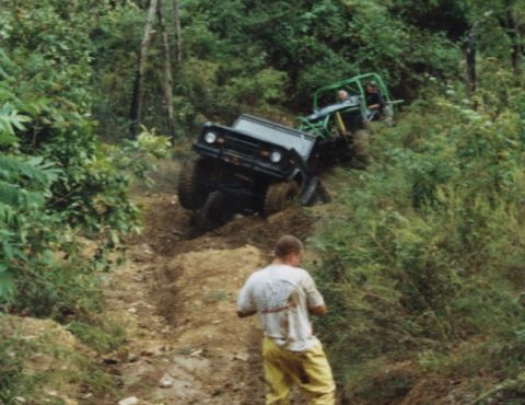 1987 Ford Bronco - Doc being twisted by Twister 3. Slim looks on with his 4wheeler paper pants.