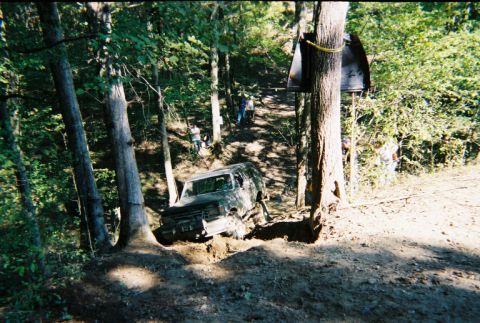 1987 Ford Bronco - Mark snaps a Dana 44 when he hits a rock under power. Ouch!
