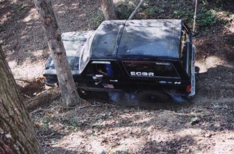 1987 Ford Bronco - I can't get my wide arse through "Bents and Dents" without getting WAY too close to some of its trees. OUCH! Somewhere in here I pick up a…
