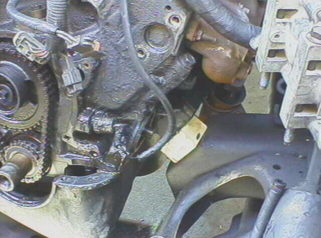 I hope this is enough clearance to get the oil pan out.