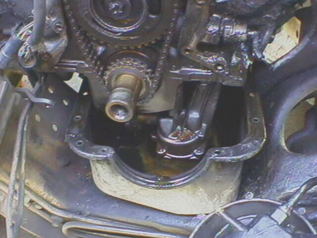 Well, not enough room to drop it, so I am going to cut the driver side exhaust that crosses underneath and then clamp it back together.