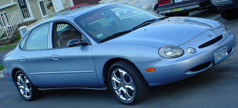 Blue 1998 Ford Taurus 3/4 front view