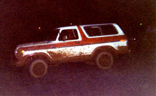 1978 Ford Bronco - This 1978 Ford Bronco is seen in a 3/4 front view, covered in mud.