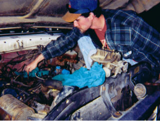 1978 Ford Bronco - Heres a pic of Roy helping me change the carb out on my bronco. I could have done it but I let him do it so I wouldnt have to.