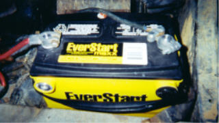 1978 Ford Bronco - Car battery with EverStart Maxx branding and attached cables.