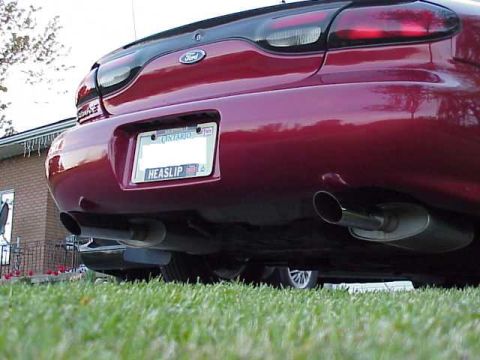 1998 Ford Taurus - Rear view of a 1998 Ford Taurus showing its dual exhaust system and license plate.