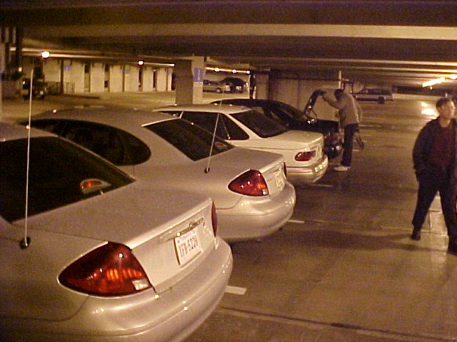 Rear view of a silver 2001 Ford Taurus with a license plate visible