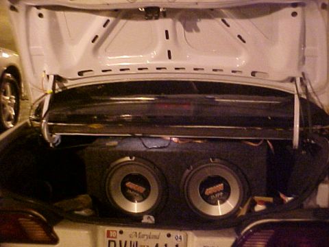 2001 Ford Taurus - Dual subwoofers installed in the trunk of a car. The license plate reads Maryland 04.