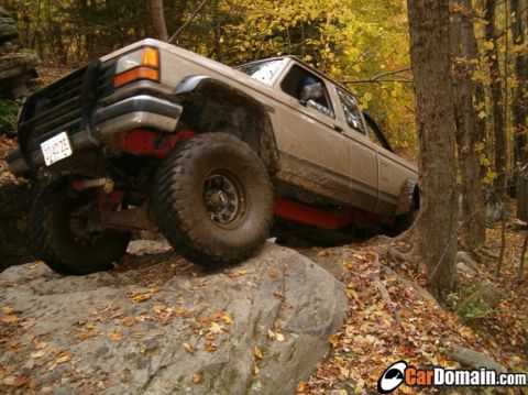 1990 Ford Ranger - This 1990 Ford Ranger is navigating a rocky obstacle on an off-road trail.