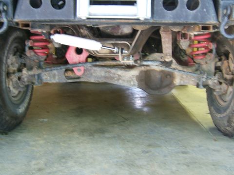 1993 Ford Bronco - Close-up of the front axle and suspension components on a 1993 Ford Bronco.