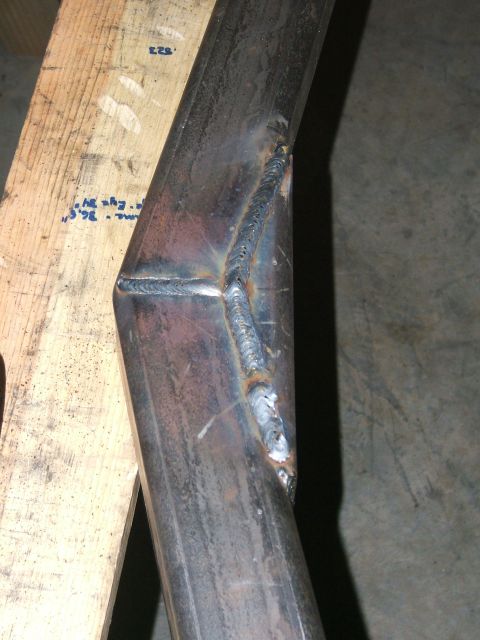 1993 Ford Bronco - Close-up of a welded metal frame section, showing the detail of the weld beads.