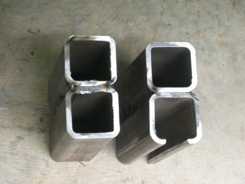1993 Ford Bronco - Two sets of welded square steel tubing sections are shown on a concrete surface.