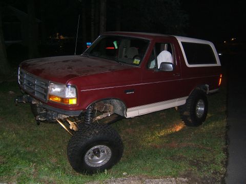 1993 Ford Bronco - This lifted Ford Bronco has a two-tone paint scheme and aftermarket wheels.