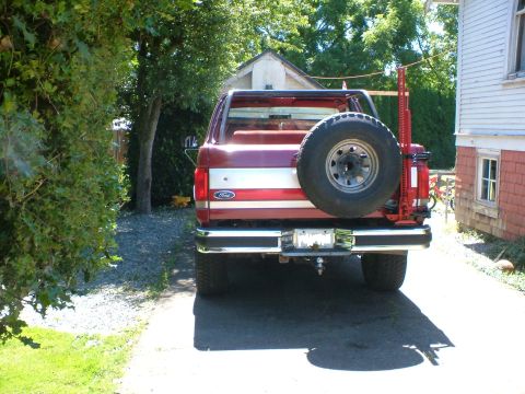 1989 Ford Bronco - Rear view of a 1989 Ford Bronco, equipped with a spare tire and a Hi-Lift jack.