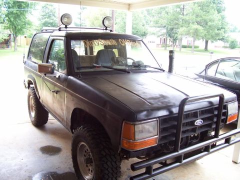 1989 Ford Bronco II - This Ford Bronco II has been modified for off-road use, extra lights and a prominent brush guard.