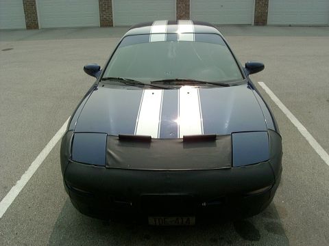 1995 Ford Probe - Front view of a blue 1995 Ford Probe with racing stripes and a car bra.