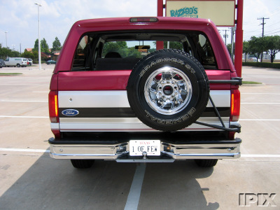 1995 Ford Bronco - This 1995 Ford Bronco is shown from the rear, a spare tire and a custom license plate.