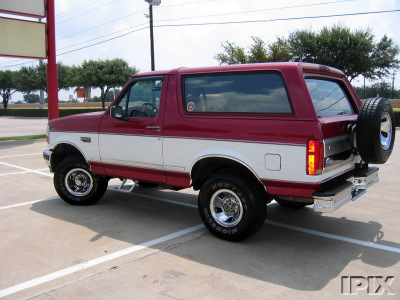 1995 Ford Bronco - This two-tone 1995 Ford Bronco is shown from the rear three-quarter view.