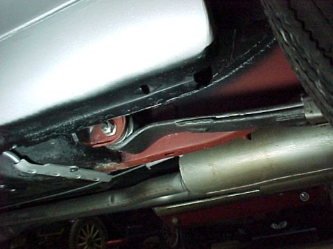 1968 Mercury Cougar - Undercarriage view of a vehicle, showing suspension and exhaust components. Text visible: SUPERMOTORS.NET.