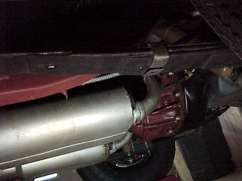 1968 Mercury Cougar - The underside of a vehicle shows the exhaust pipe and rear axle assembly, with a watermark for Supermotors.net.