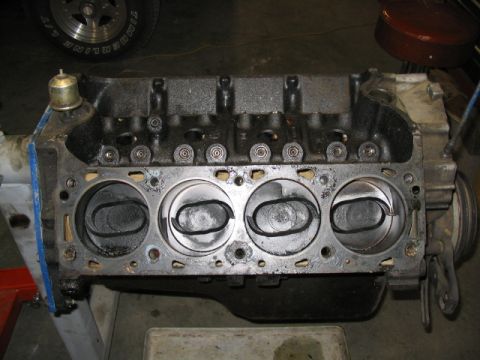 1979 Ford F-150 - Close-up view of an engine block, revealing the pistons within the cylinders.