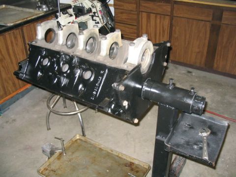 1979 Ford F-150 - This engine block is mounted on a stand in what appears to be a workshop or garage setting.