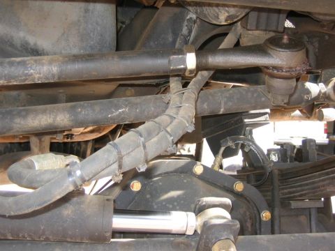 1994 Ford Bronco - Undercarriage view of a vehicle's steering and suspension system, with a visible watermark.