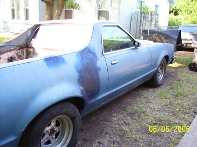 1972 Ford Ranchero - This light blue pickup truck shows signs of recent bodywork on the rear quarter panel and appears to be undergoing restoration. The date st…